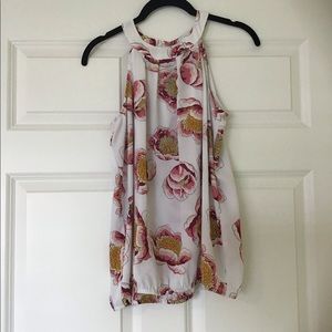 Cute floral sleeveless top.